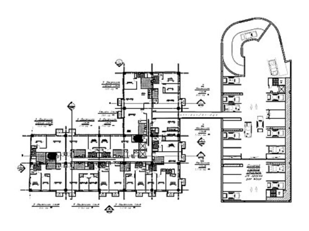 Architectural plan showing the relationship between residential building wings, connecting corridors, elevators, and adjacent parking facilities.