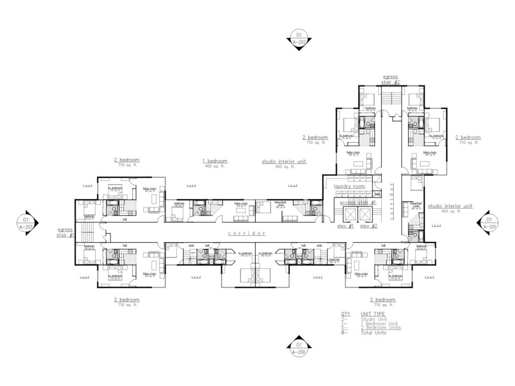 Architectural residential floor plan showing studio, one-bedroom, and two-bedroom apartments arranged around a central corridor with elevators, laundry room, and stair access.
